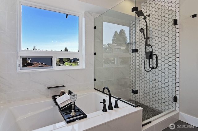 8536 S 114th St, Seattle, WA 98178 - full bath with a shower stall, a garden tub, and a healthy amount of sunlight