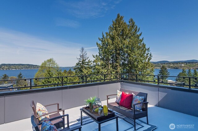 8536 S 114th St, Seattle, WA 98178 - view of patio featuring a water view, an outdoor living space, and a balcony
