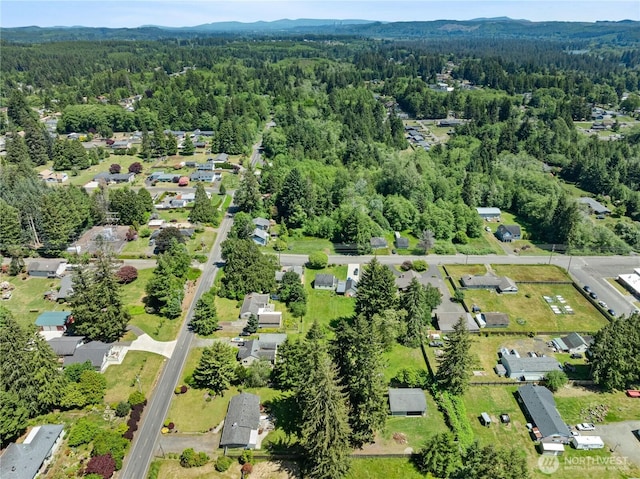 6507 Karjala Rd, Aberdeen, WA 98520 - aerial view of property and surrounding area with a heavily wooded area