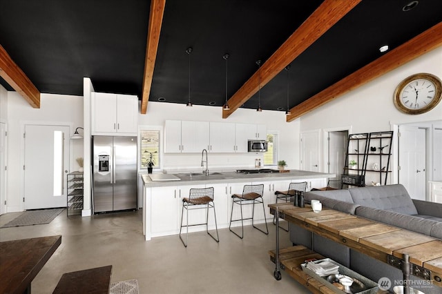 living room with finished concrete floors, beam ceiling, and high vaulted ceiling