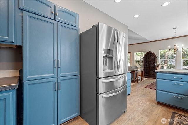 kitchen with recessed lighting, stainless steel fridge with ice dispenser, light wood-type flooring, a chandelier, and blue cabinetry