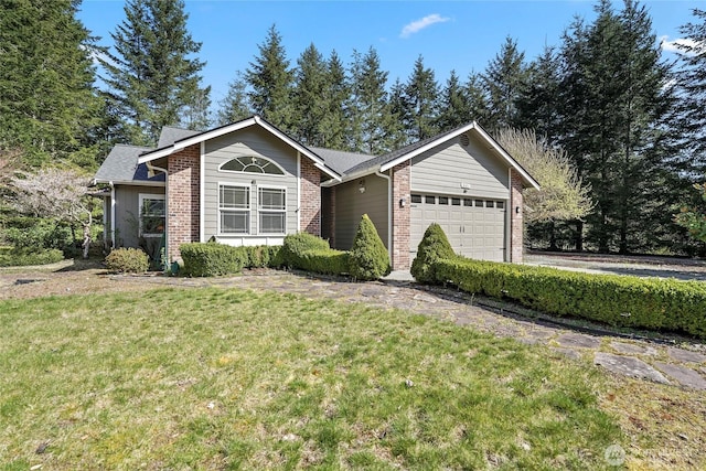 single story home with brick siding, an attached garage, and a front lawn