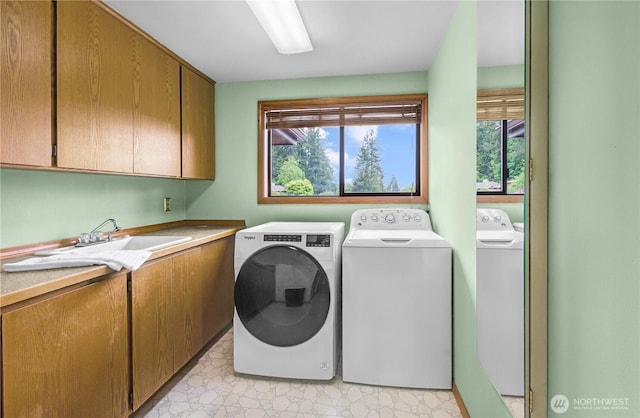 806 Alpine Dr, Everett, WA 98203 - laundry room with cabinet space, independent washer and dryer, and light floors