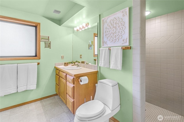 806 Alpine Dr, Everett, WA 98203 - bathroom with toilet, baseboards, walk in shower, vanity, and tile patterned floors