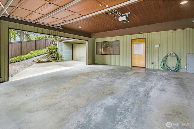 806 Alpine Dr, Everett, WA 98203 - garage with a garage door opener and wood walls