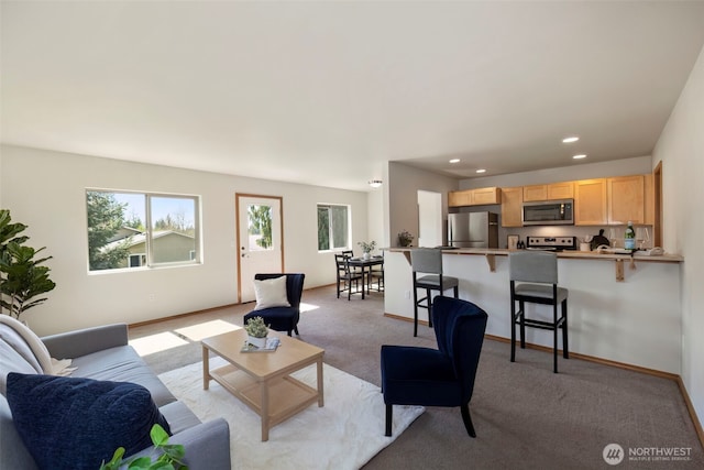 382 NE Ohenry Ct, Poulsbo, WA 98370 - living room with baseboards, recessed lighting, and light colored carpet