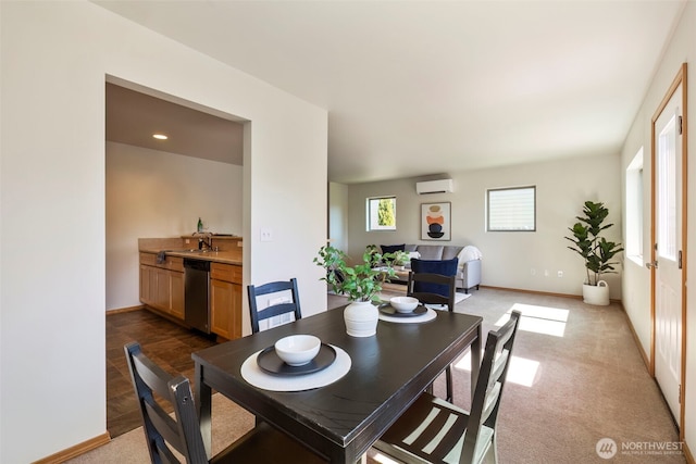 382 NE Ohenry Ct, Poulsbo, WA 98370 - dining room with an AC wall unit, baseboards, and light colored carpet