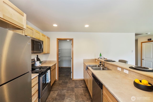 382 NE Ohenry Ct, Poulsbo, WA 98370 - kitchen with a sink, light brown cabinetry, light countertops, appliances with stainless steel finishes, and recessed lighting
