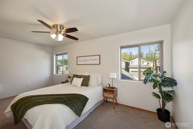 382 NE Ohenry Ct, Poulsbo, WA 98370 - bedroom featuring baseboards, carpet floors, and ceiling fan