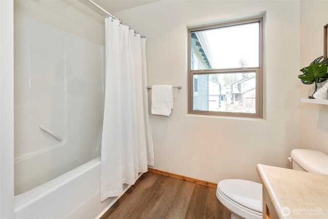 382 NE Ohenry Ct, Poulsbo, WA 98370 - full bath featuring toilet, baseboards, shower / bath combo with shower curtain, wood finished floors, and vanity