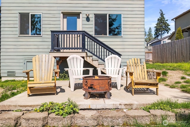 382 NE Ohenry Ct, Poulsbo, WA 98370 - rear view of property with a fire pit, fence, and a patio