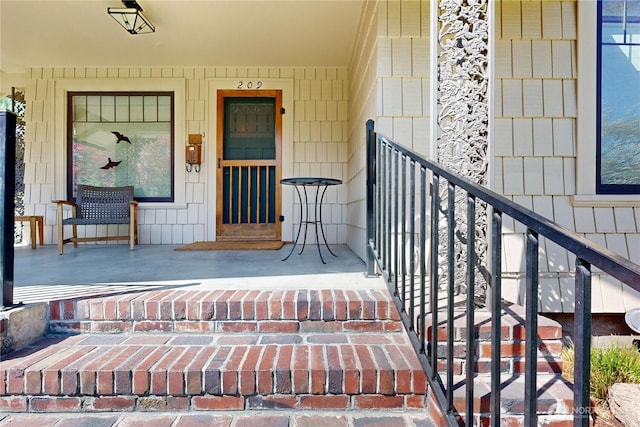 entrance to property with a porch