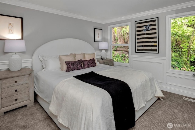 8001 Talbot Rd, Edmonds, WA 98026 - bedroom with multiple windows, carpet, and ornamental molding