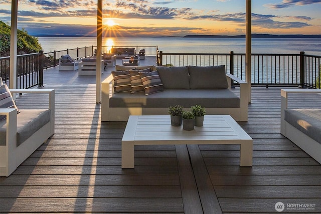 8001 Talbot Rd, Edmonds, WA 98026 - wooden terrace with an outdoor living space, a water view, and outdoor dining space