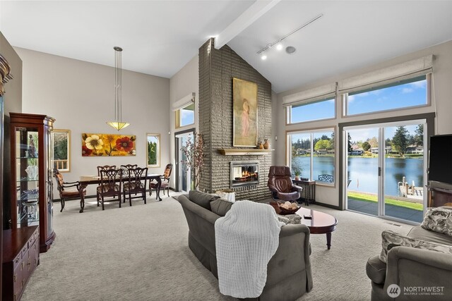 7340 Steilacoom Blvd SW, Lakewood, WA 98499 - carpeted living area with a brick fireplace, high vaulted ceiling, beam ceiling, and a healthy amount of sunlight
