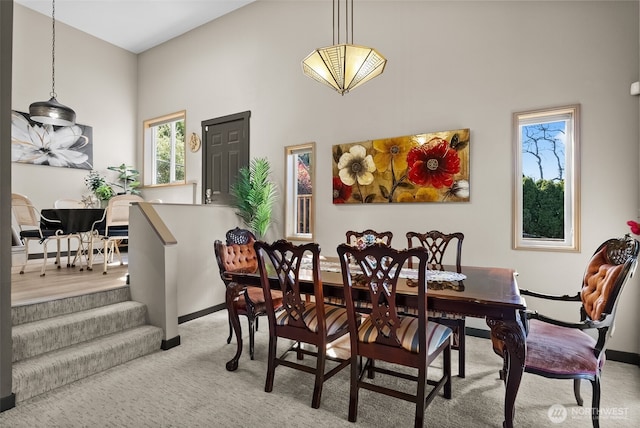 7340 Steilacoom Blvd SW, Lakewood, WA 98499 - carpeted dining area featuring a towering ceiling and baseboards