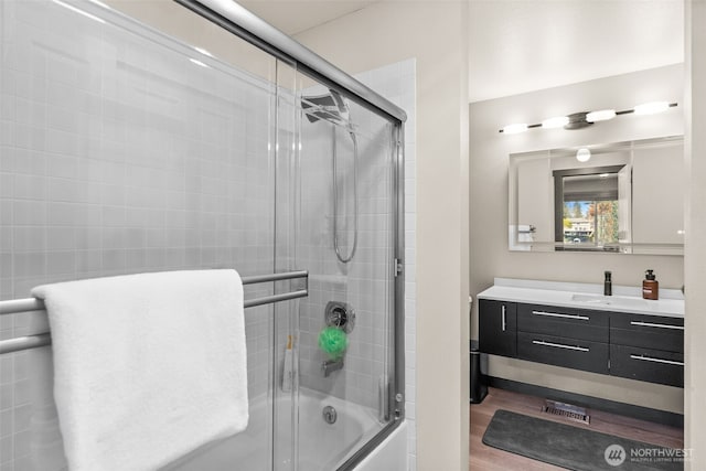 7340 Steilacoom Blvd SW, Lakewood, WA 98499 - bathroom featuring bath / shower combo with glass door, visible vents, and vanity