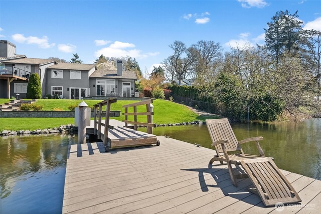 7340 Steilacoom Blvd SW, Lakewood, WA 98499 - view of dock with a lawn and a water view