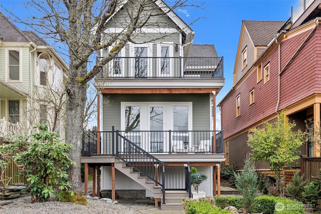 511 N E St, Tacoma, WA 98403 - back of house with a balcony, stairs, and french doors