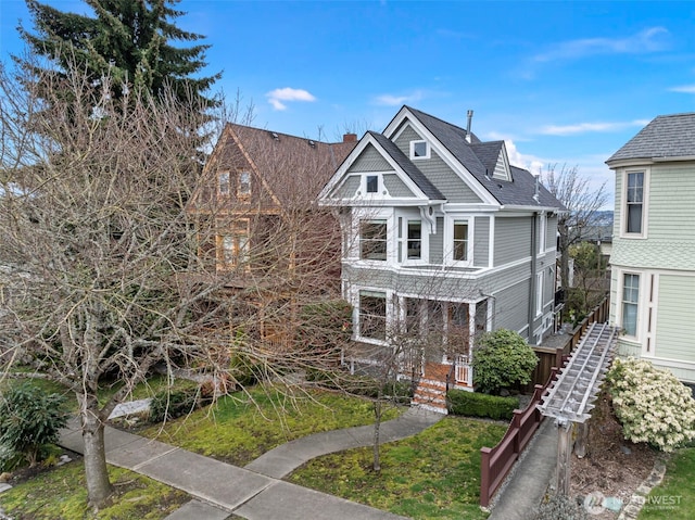 511 N E St, Tacoma, WA 98403 - view of front of home featuring a chimney and a shingled roof