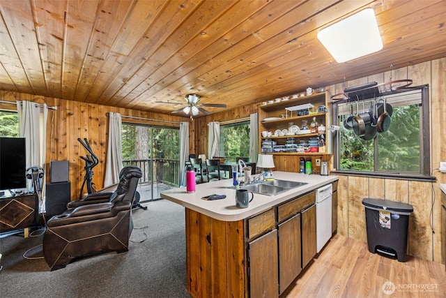 100 N Duckabush Dr W, Hoodsport, WA 98548 - kitchen featuring a sink, wooden ceiling, white dishwasher, and wooden walls