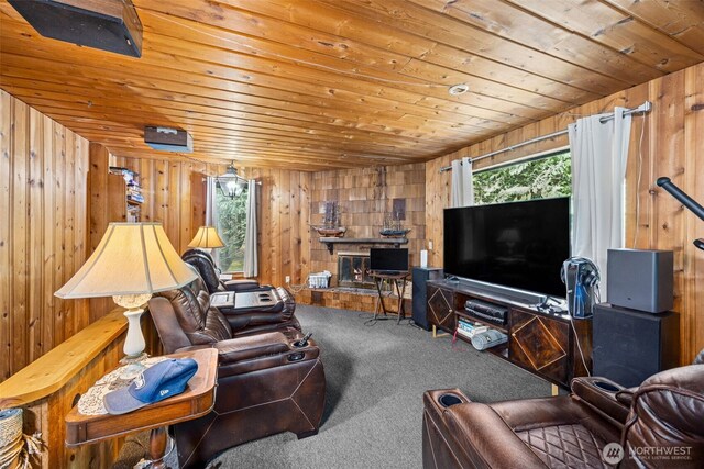 100 N Duckabush Dr W, Hoodsport, WA 98548 - carpeted living room with wood walls and wooden ceiling