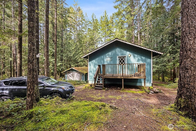 100 N Duckabush Dr W, Hoodsport, WA 98548 - rustic home featuring a wooded view