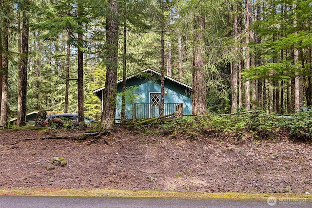 100 N Duckabush Dr W, Hoodsport, WA 98548 - exterior space featuring a wooded view