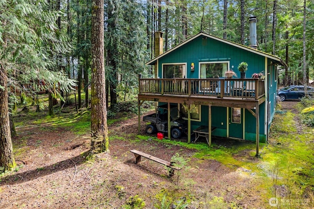 100 N Duckabush Dr W, Hoodsport, WA 98548 - back of house featuring a forest view and a wooden deck