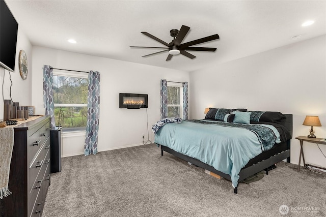 bedroom with ceiling fan, recessed lighting, carpet, and baseboards