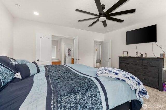 carpeted bedroom with ceiling fan and recessed lighting