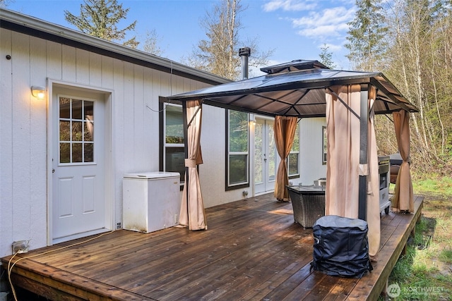 wooden terrace with a gazebo