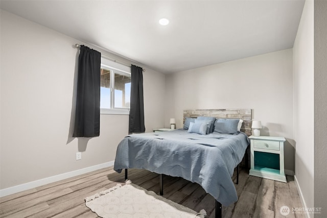 34 4th St S, Pacific Beach, WA 98571 - bedroom with baseboards and wood finished floors