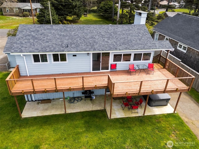 34 4th St S, Pacific Beach, WA 98571 - back of house with a patio, a shingled roof, a deck, and a lawn
