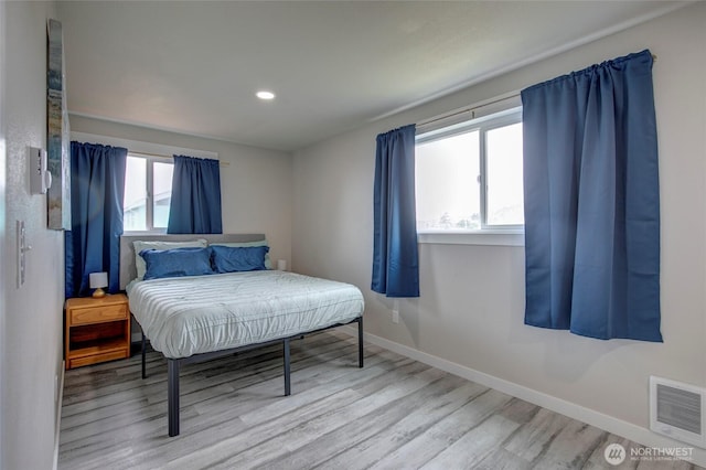 34 4th St S, Pacific Beach, WA 98571 - bedroom featuring recessed lighting, visible vents, baseboards, and wood finished floors