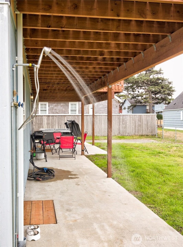 34 4th St S, Pacific Beach, WA 98571 - view of patio featuring fence and a pergola