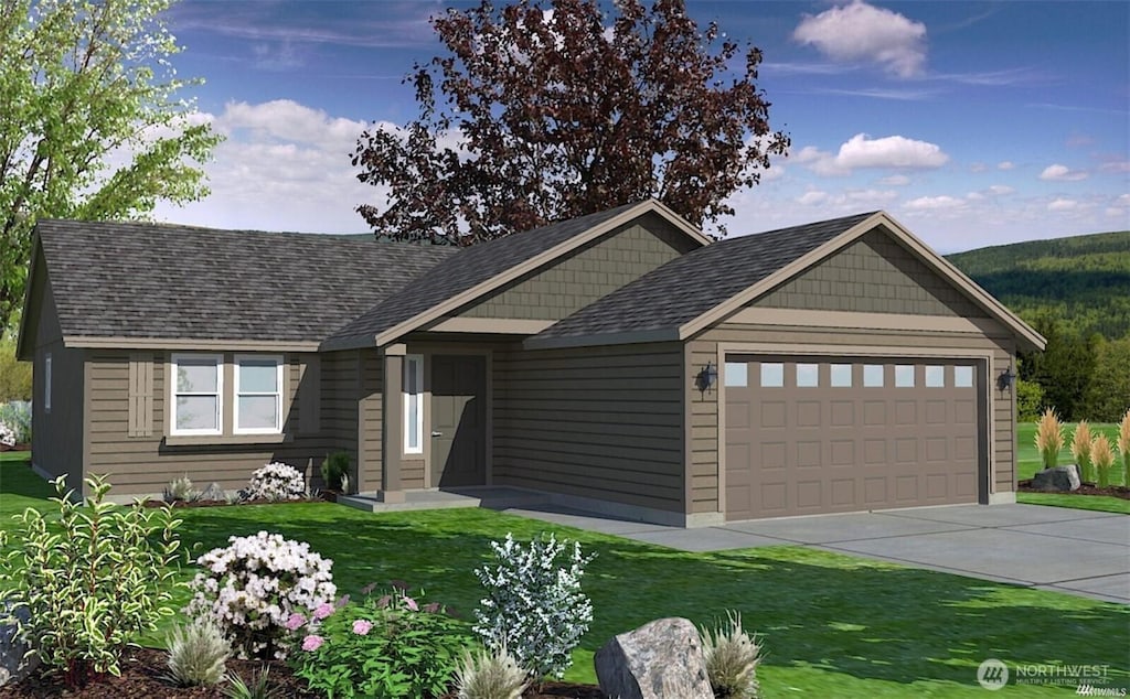 view of front of property featuring driveway, a front lawn, and a garage