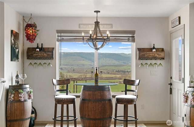 461 Deer Valley Dr, Ellensburg, WA 98926 - dining area with a chandelier and baseboards