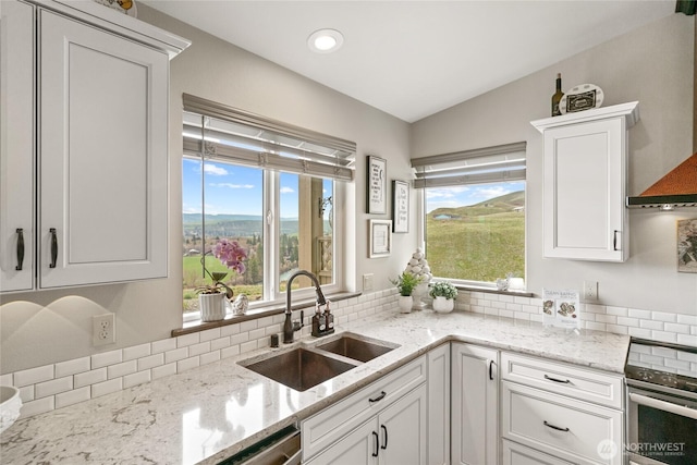 461 Deer Valley Dr, Ellensburg, WA 98926 - kitchen featuring tasteful backsplash, wall oven, a sink, and white cabinetry