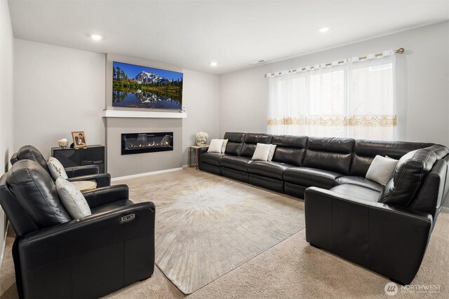 19815 152nd Street Ct E, Bonney Lake, WA 98391 - living room with baseboards, carpet floors, a glass covered fireplace, and recessed lighting
