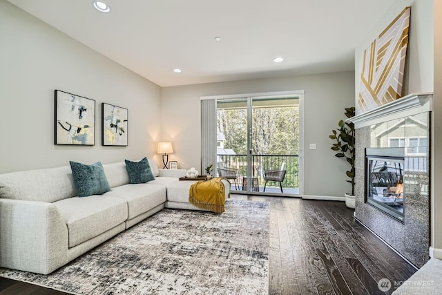 2546 NE Mulberry Walk, Issaquah, WA 98029 - living area with baseboards, a glass covered fireplace, dark wood-style floors, and recessed lighting