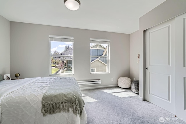2546 NE Mulberry Walk, Issaquah, WA 98029 - carpeted bedroom featuring a baseboard radiator
