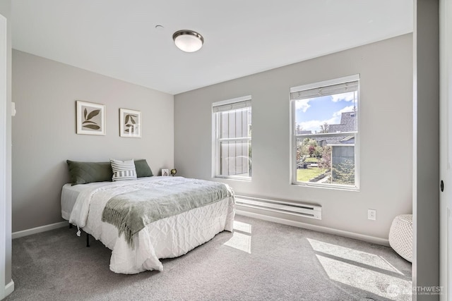 2546 NE Mulberry Walk, Issaquah, WA 98029 - bedroom featuring a baseboard heating unit, baseboards, and carpet flooring