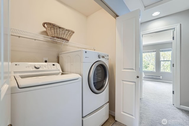 2546 NE Mulberry Walk, Issaquah, WA 98029 - laundry room featuring baseboard heating, washing machine and clothes dryer, light carpet, baseboards, and laundry area