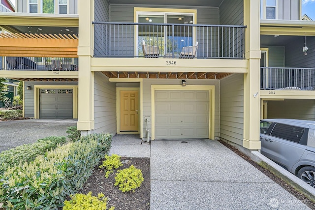 2546 NE Mulberry Walk, Issaquah, WA 98029 - doorway to property with an attached garage and driveway