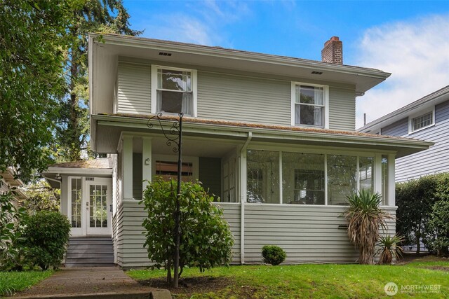 5019 17th Ave NE, Seattle, WA 98105 - view of front of property featuring a sunroom and a chimney
