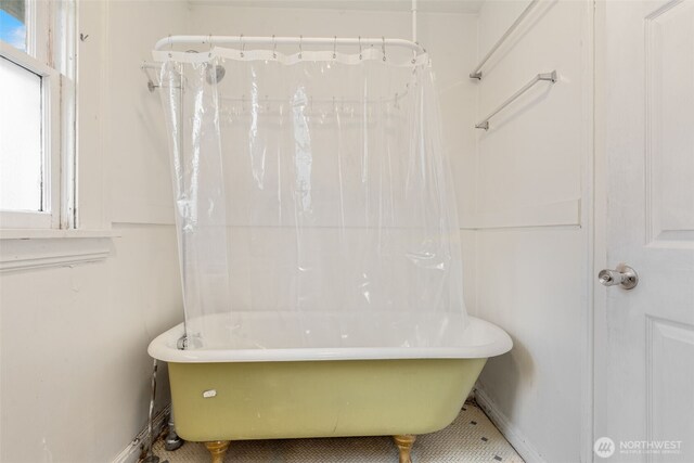 5019 17th Ave NE, Seattle, WA 98105 - bathroom featuring plenty of natural light and baseboards