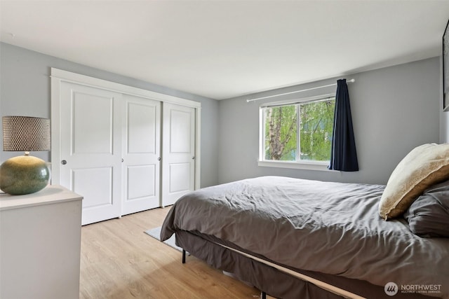 300 N 130th St Unit 8302, Seattle, WA 98133 - bedroom featuring a closet and light wood finished floors