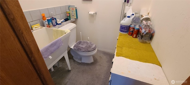 bathroom featuring toilet