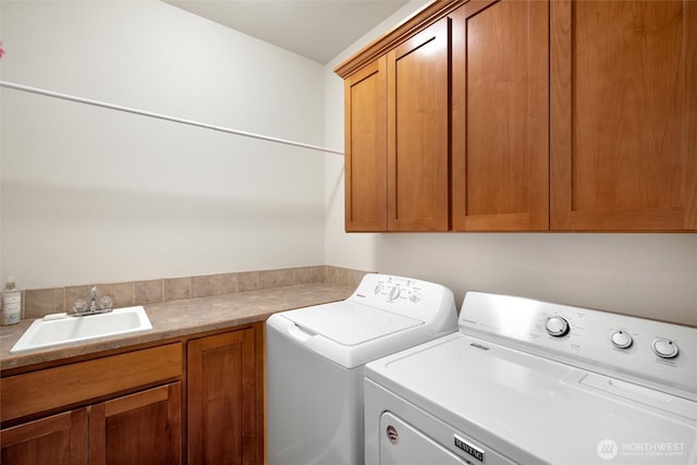 8148 Quinault Rd, Blaine, WA 98230 - washroom with separate washer and dryer, a sink, and cabinet space